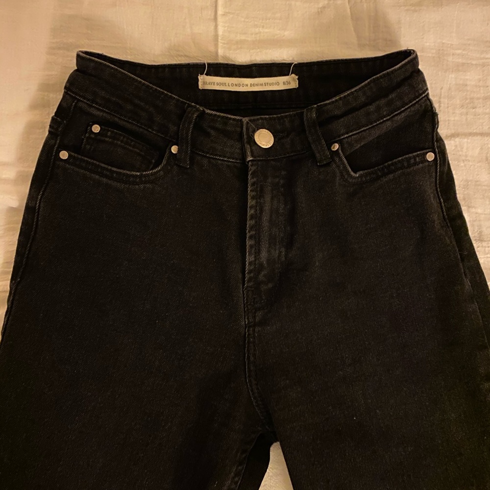 Black straight leg cut off jeans